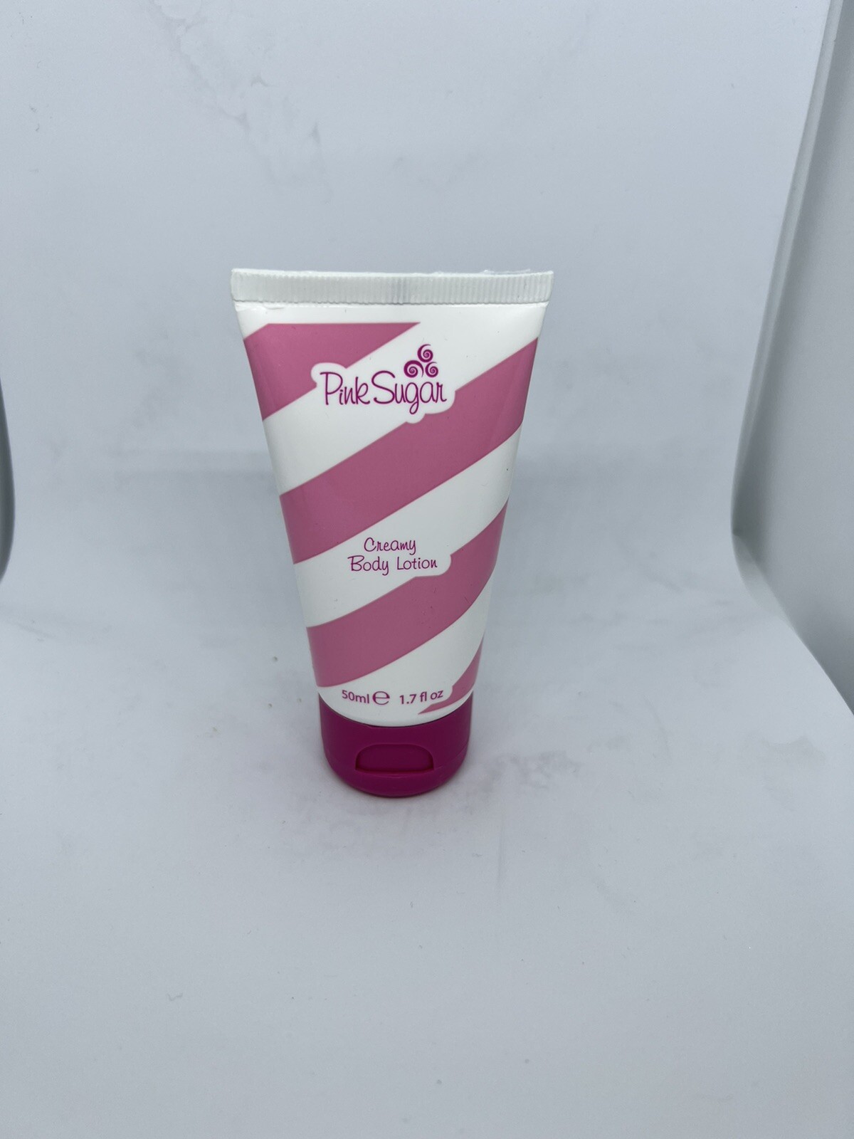 Aquolina ~ Pink Sugar ~ travel size creamy body lotion ~ 1.7 oz new no box