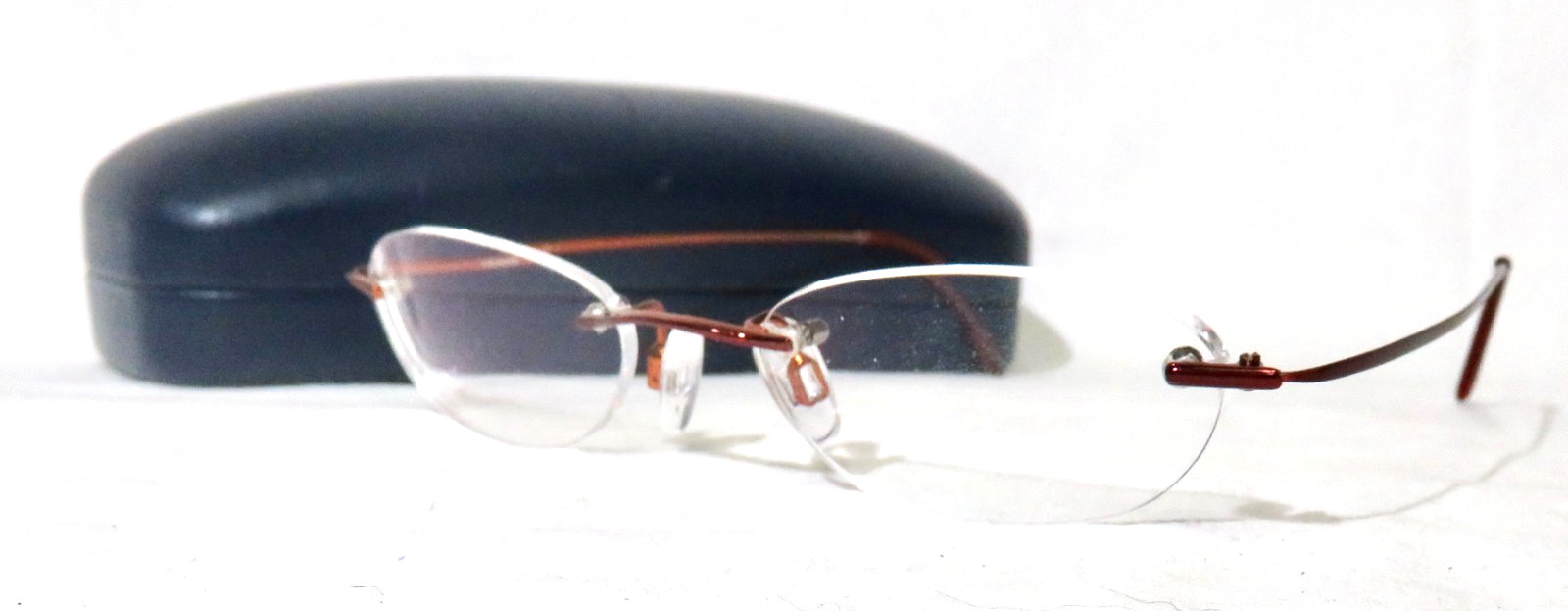 Lacoste 8028 F1335 eyewear 48-19-150 Rimless w/ Burgundy metal eyeglass frame